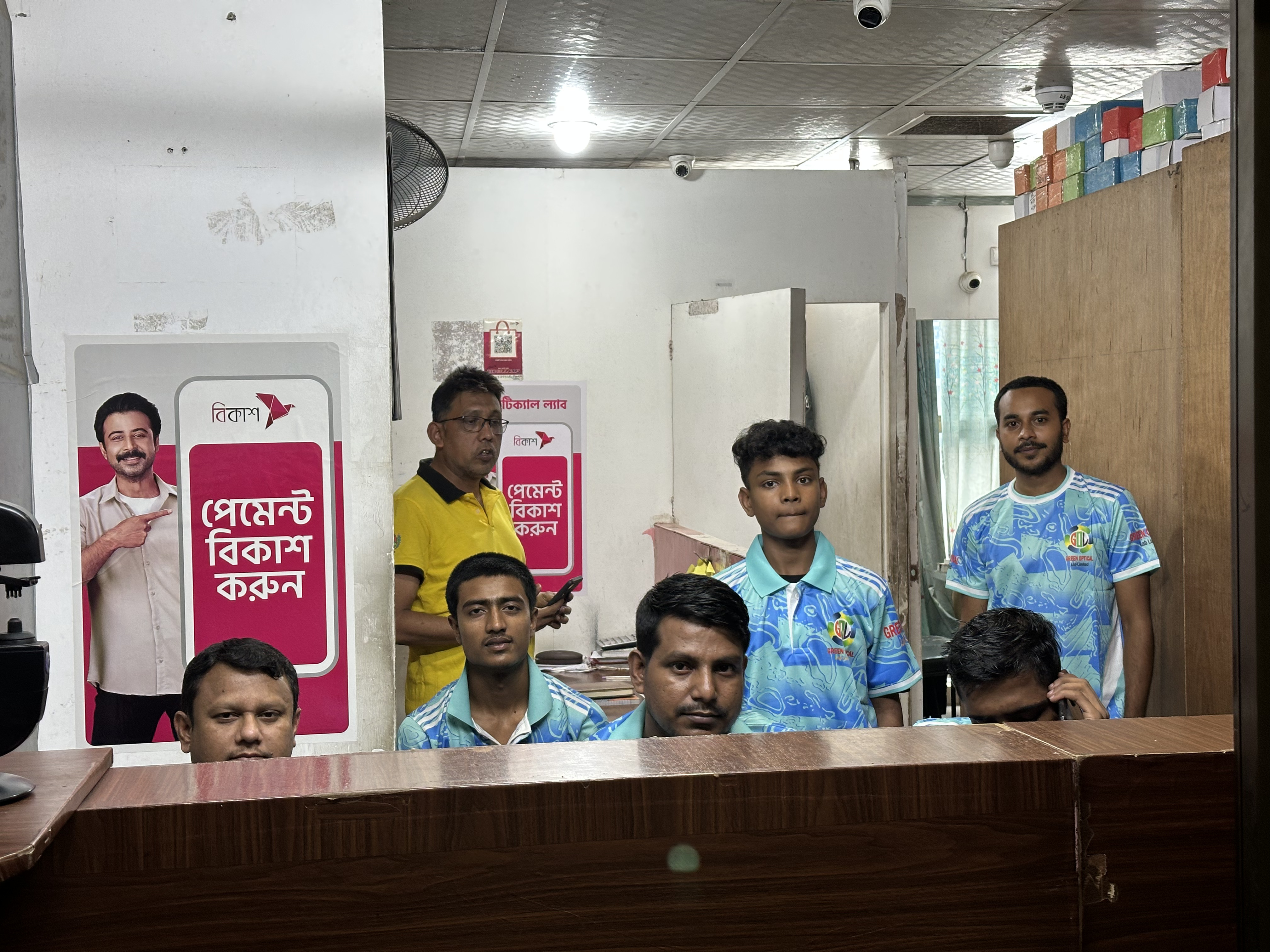 Green Optical Lab team and company